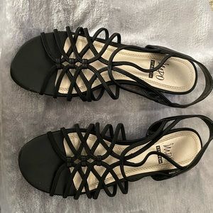 Ladies black lightly stretchable sandal. Size 6 1/2 comfortable to wear
